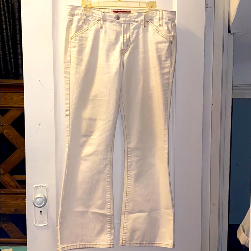 Levi off-white jeans with camel color stitching